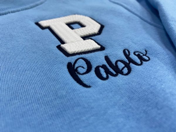 sudaderainicialesceleste2